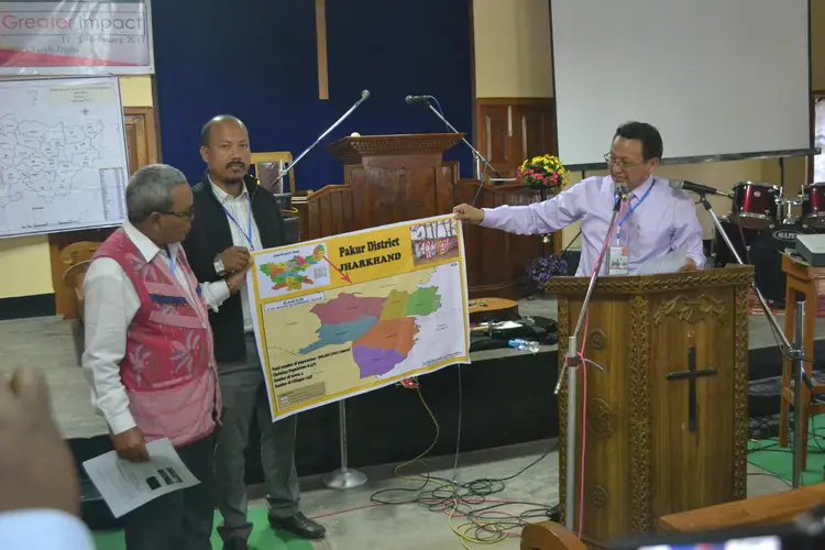Rev. Dr. Jolly Rimai, Handing over Map of the Mission Field