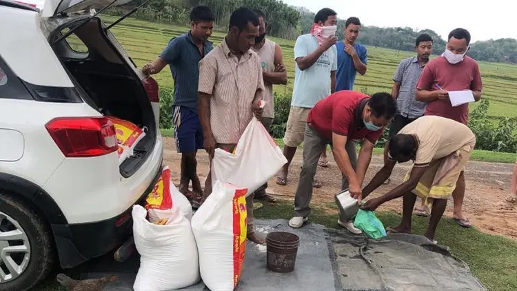 Relief materials being distributed to villagers